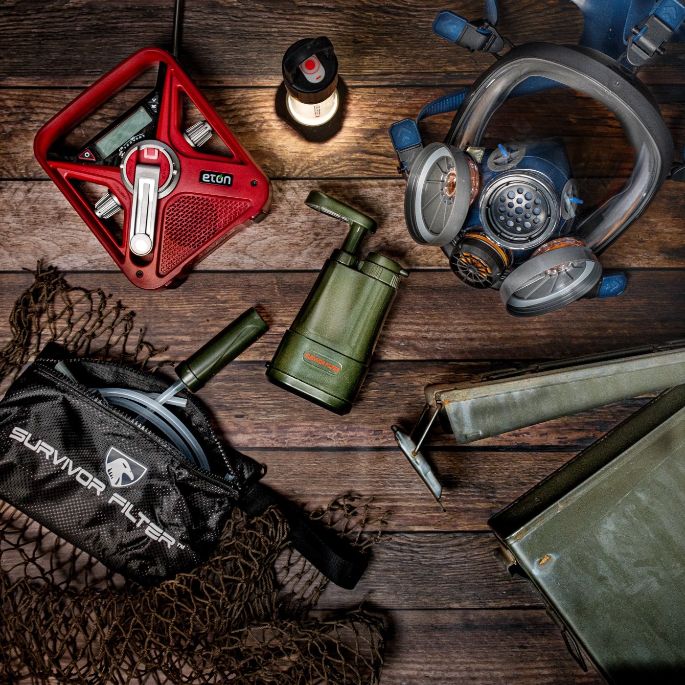 Radio, water filter and respirator gear layout