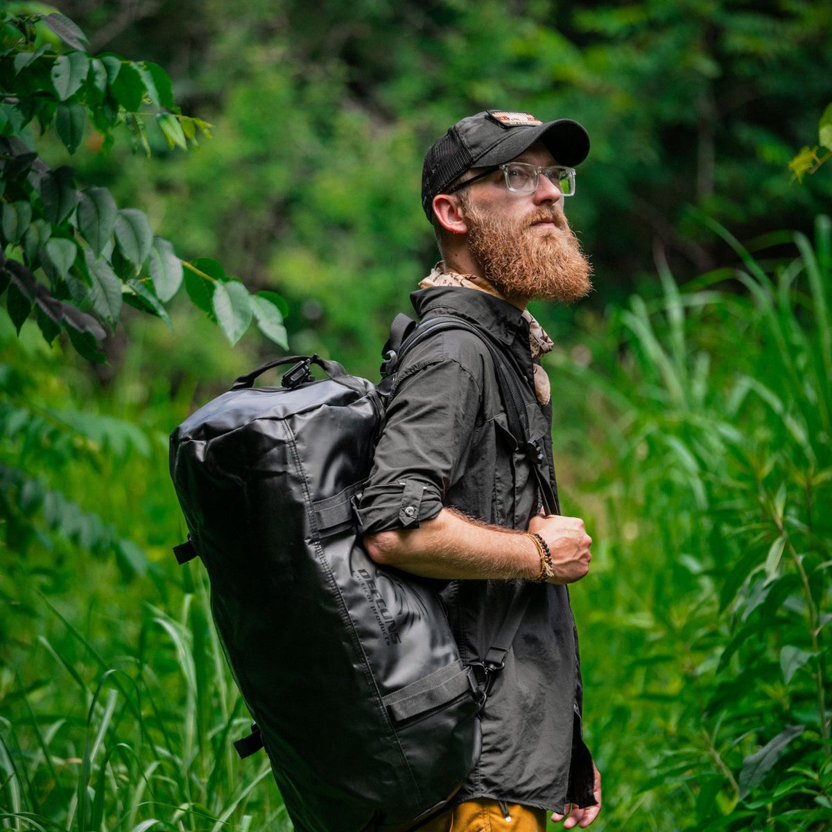 BattlBox member wearing the Defcon 5 duffle as a backpack