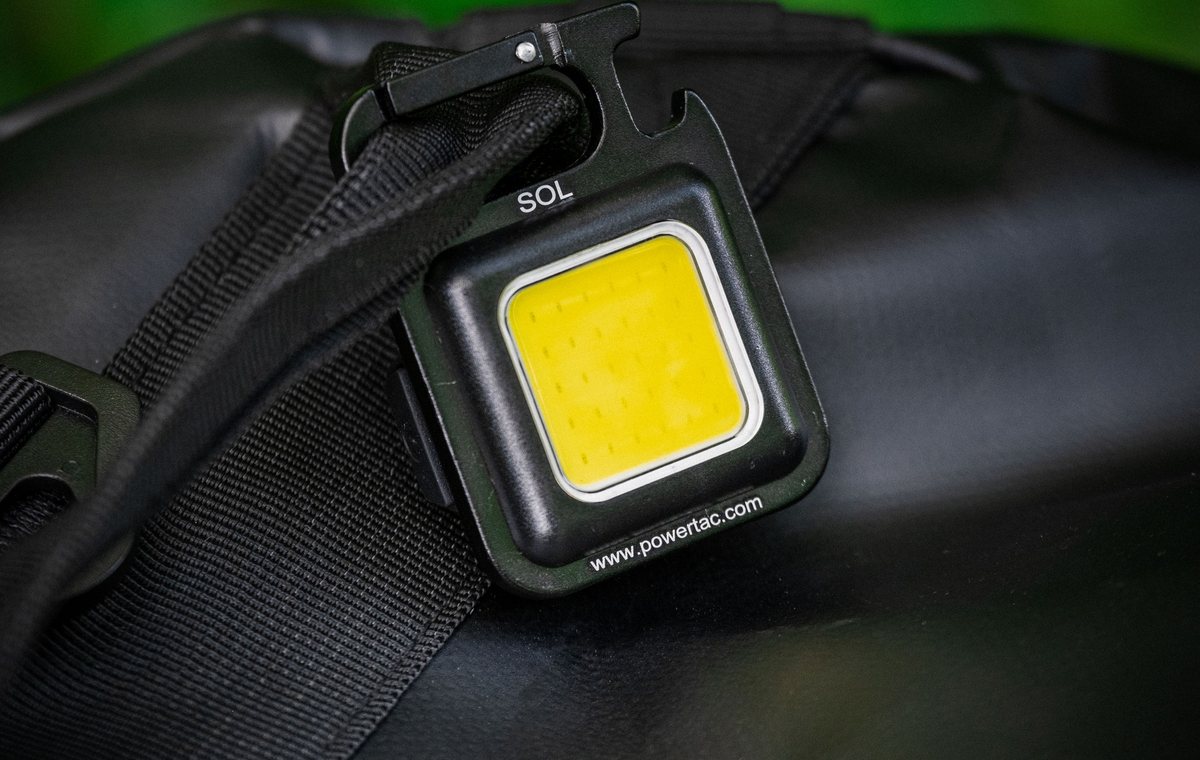Powertac SOL keychain light clipped to the Defcon 5 duffle