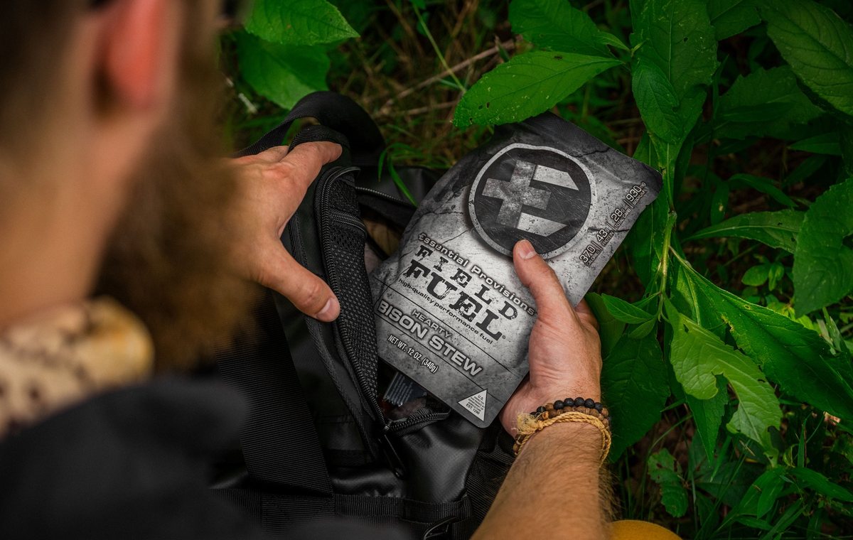 Pulling the bison stew MRE out of the survival bag